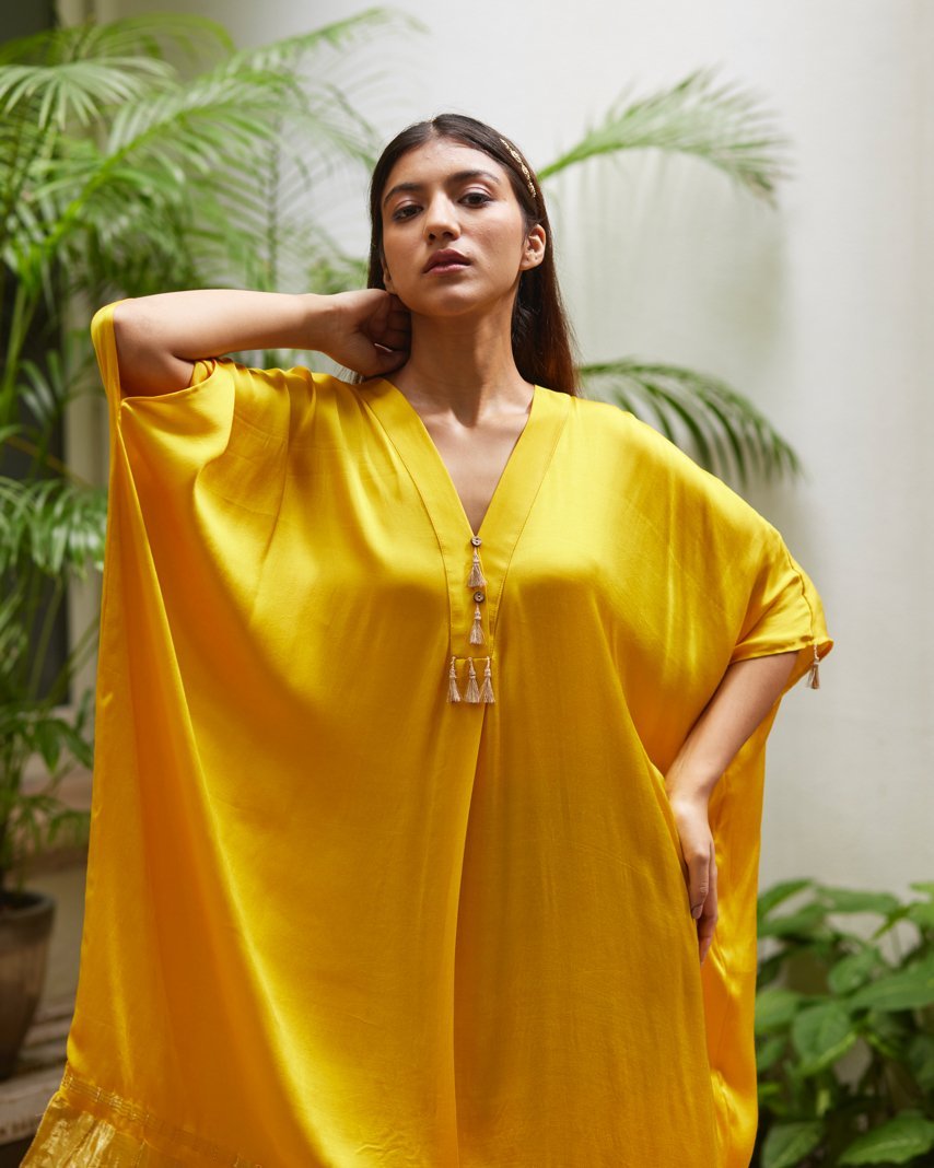 Yellow Silk Kaftan With Golden Border by Mayura Kumar with Ajrakh Heritage, Casual Wear, Dresses, Festive Wear, Kaftans, Mayura Kumar, Modal Silk, Relaxed Fit, Solids, Womenswear, Yellow at Kamakhyaa for sustainable fashion