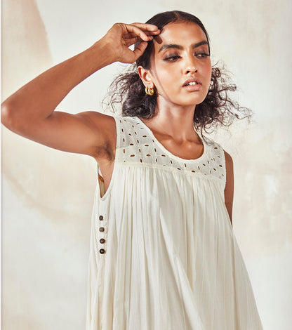 Ivory Sleeveless Dress at Kamakhyaa by Khara Kapas. This item is Best Selling, Endless Summer, Midi Dresses, Mulmul, Natural, Regular Fit, Resort Wear, Sleeveless Dresses, Solids, White, Womenswear