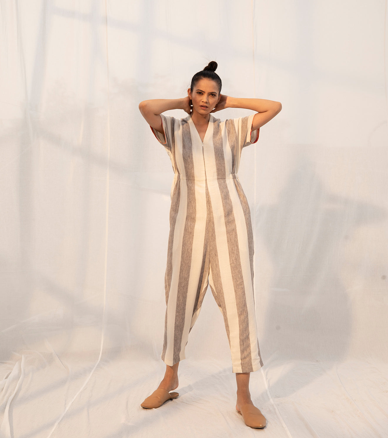 Grey And White Jumpsuit at Kamakhyaa by Khara Kapas. This item is Cotton, Cotton Khadi, Evening Wear, Grey, Jumpsuits, Multicolor, Natural, Regular Fit, Sienna KK, Stripes, Womenswear