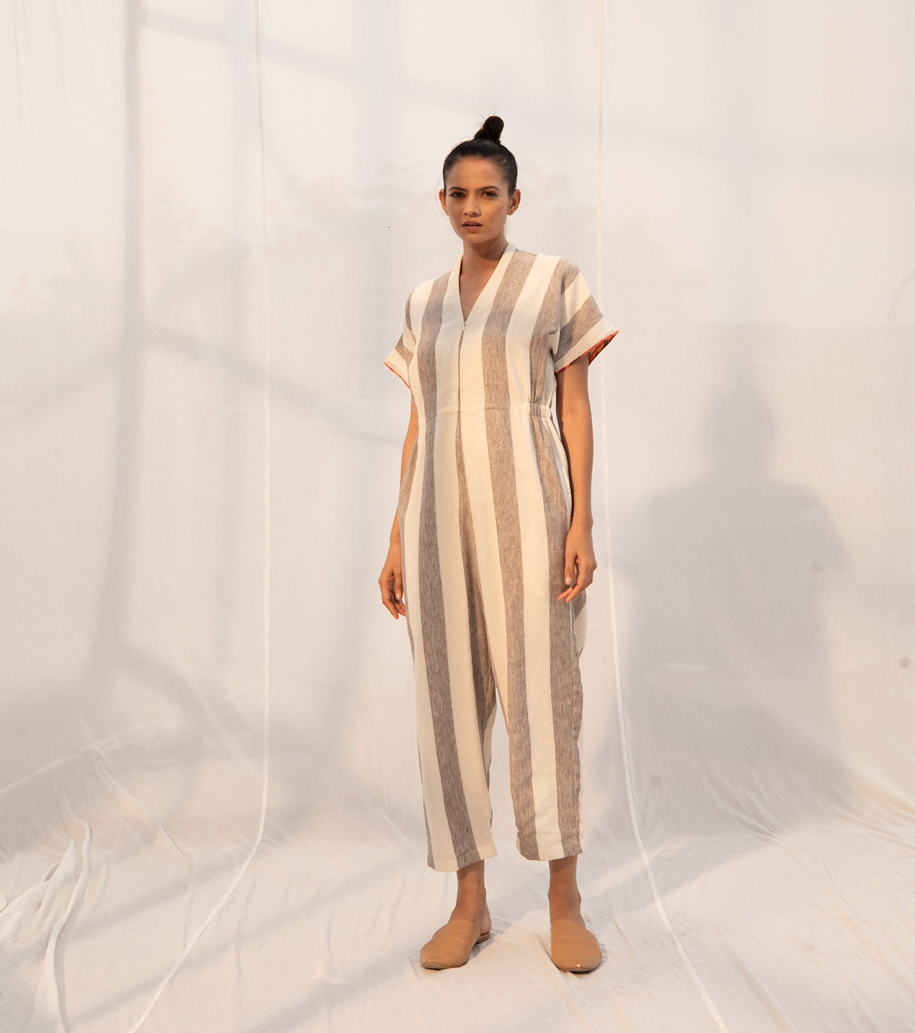 Grey And White Jumpsuit at Kamakhyaa by Khara Kapas. This item is Cotton, Cotton Khadi, Evening Wear, Grey, Jumpsuits, Multicolor, Natural, Regular Fit, Sienna KK, Stripes, Womenswear