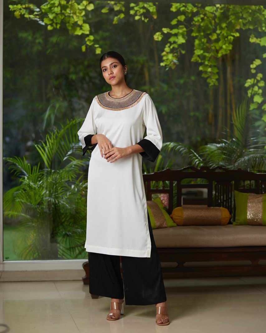 White And Black Satin Silk Kurta Pant Set by Mayura Kumar with Black, Casual Wear, Festive Wear, Kurta Pant Sets, Mayura Kumar, Regular Fit, Satin, Silk, Solids, Timeless Elegance, White, Womenswear at Kamakhyaa for sustainable fashion