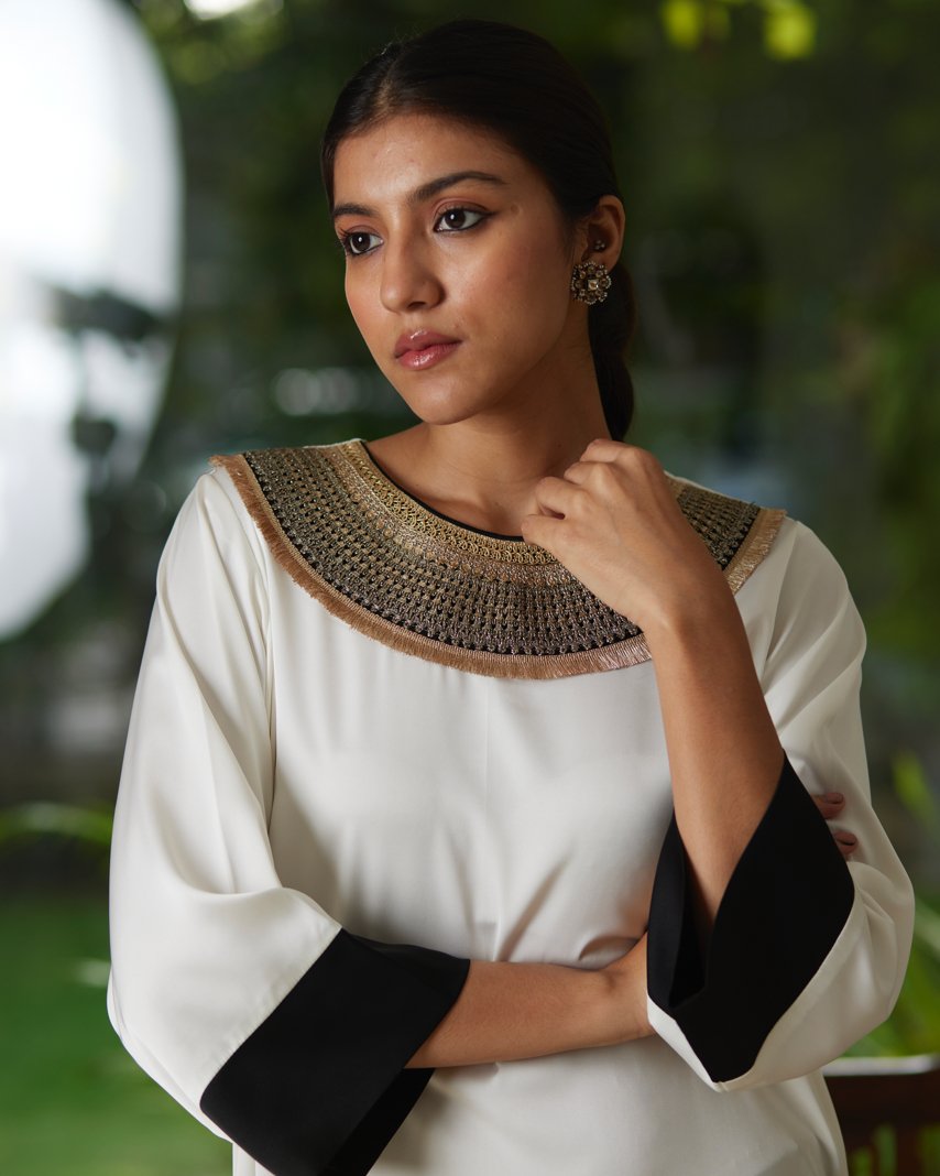 White And Black Satin Silk Kurta Pant Set by Mayura Kumar with Black, Casual Wear, Festive Wear, Kurta Pant Sets, Mayura Kumar, Regular Fit, Satin, Silk, Solids, Timeless Elegance, White, Womenswear at Kamakhyaa for sustainable fashion