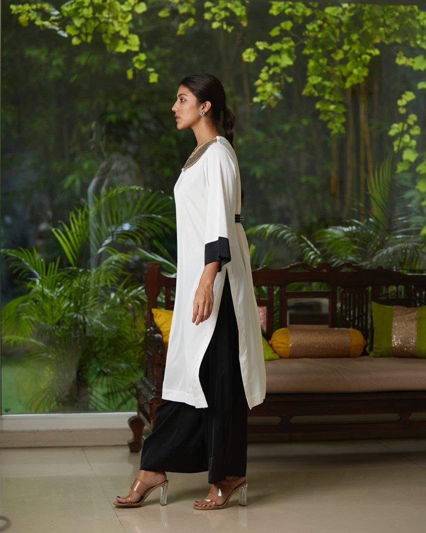 White And Black Satin Silk Kurta Pant Set by Mayura Kumar with Black, Casual Wear, Festive Wear, Kurta Pant Sets, Mayura Kumar, Regular Fit, Satin, Silk, Solids, Timeless Elegance, White, Womenswear at Kamakhyaa for sustainable fashion