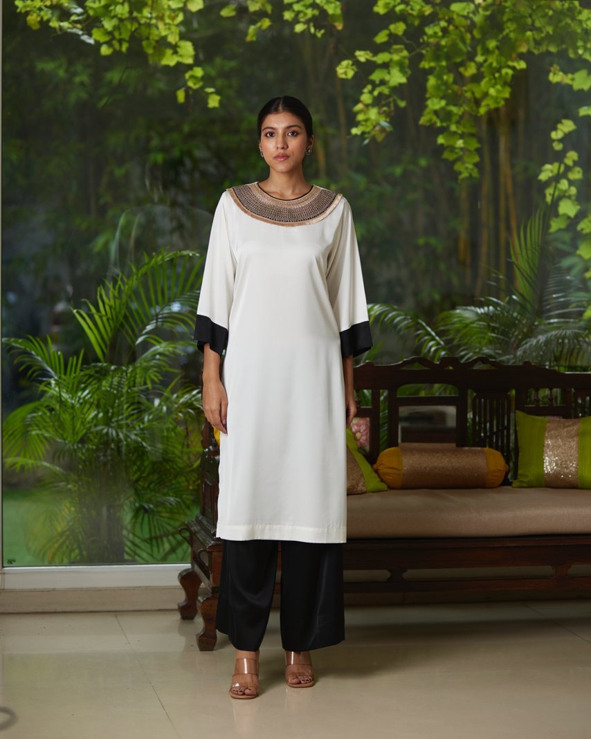 White And Black Satin Silk Kurta Pant Set by Mayura Kumar with Black, Casual Wear, Festive Wear, Kurta Pant Sets, Mayura Kumar, Regular Fit, Satin, Silk, Solids, Timeless Elegance, White, Womenswear at Kamakhyaa for sustainable fashion